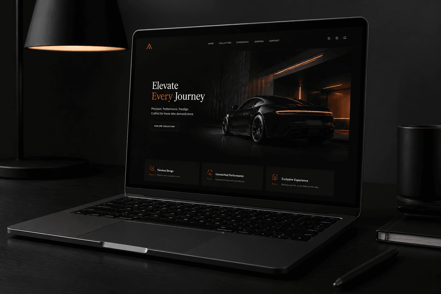 Laptop displaying a dark luxury website in a studio